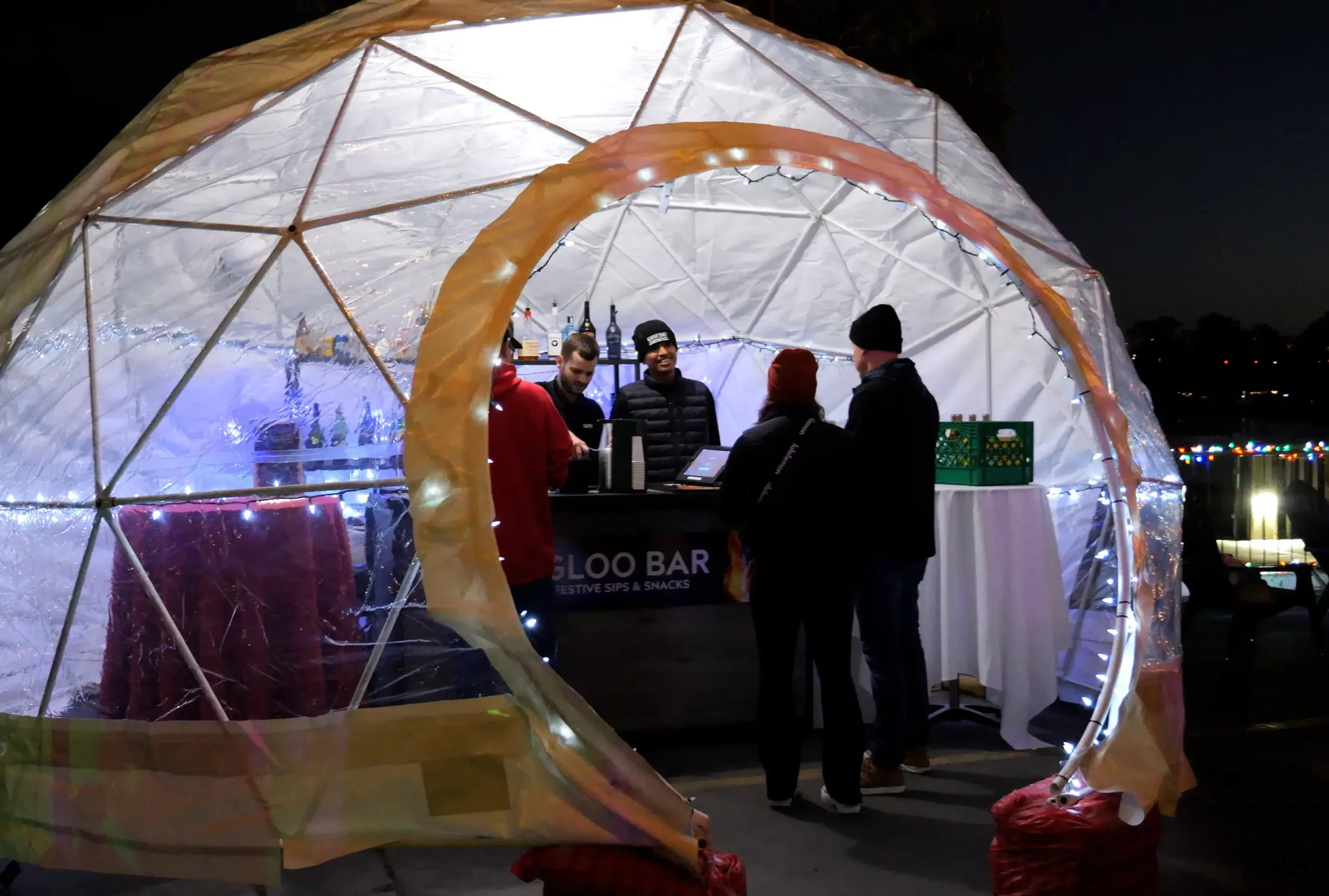 rink side igloo bar at Fire & Ice Festival