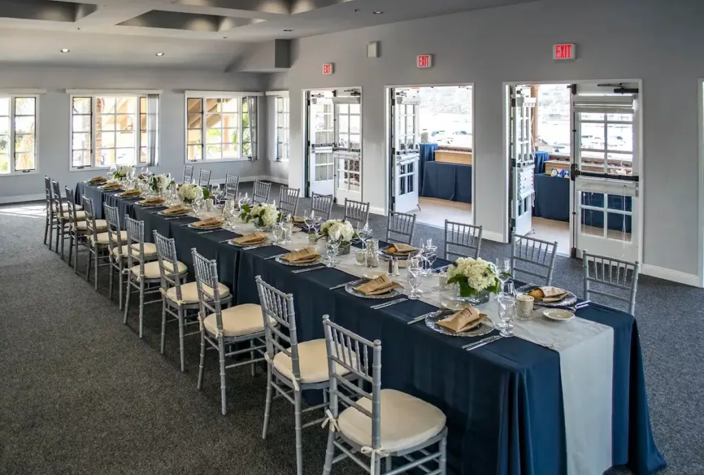 Marina clubhouse venue set up for small wedding reception